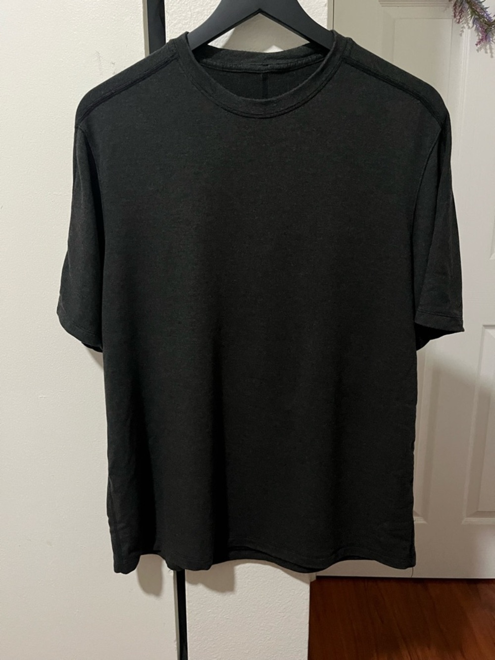 Dark Charcoal Grey lululemon gym shirt.